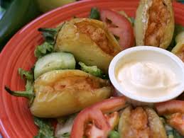 Peppers Mexicali Cafe signature dishes Grilled PepperChicken NachosChicken Caribe